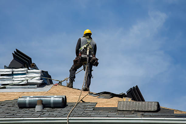 Professional Roof Replacement technician working in Fredericktown, OH